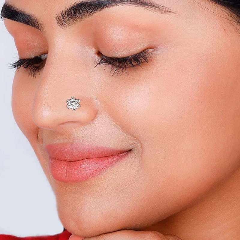  Picture of woman wearing a nose pin