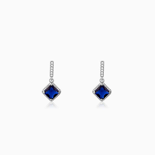 Silver rhombus earrings with blue stone and zircon accents
