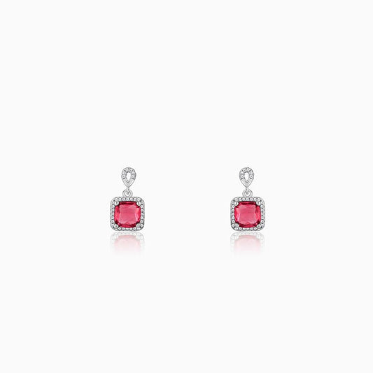 Silver earrings with pink stone and zircon accents in a square design.
