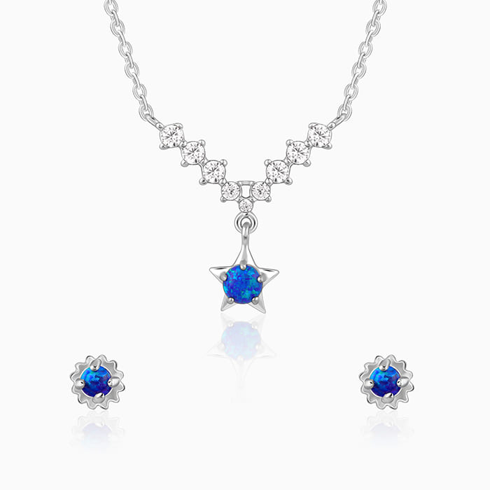 Blue opal necklace and earrings set with star motifs and zircon accents.






