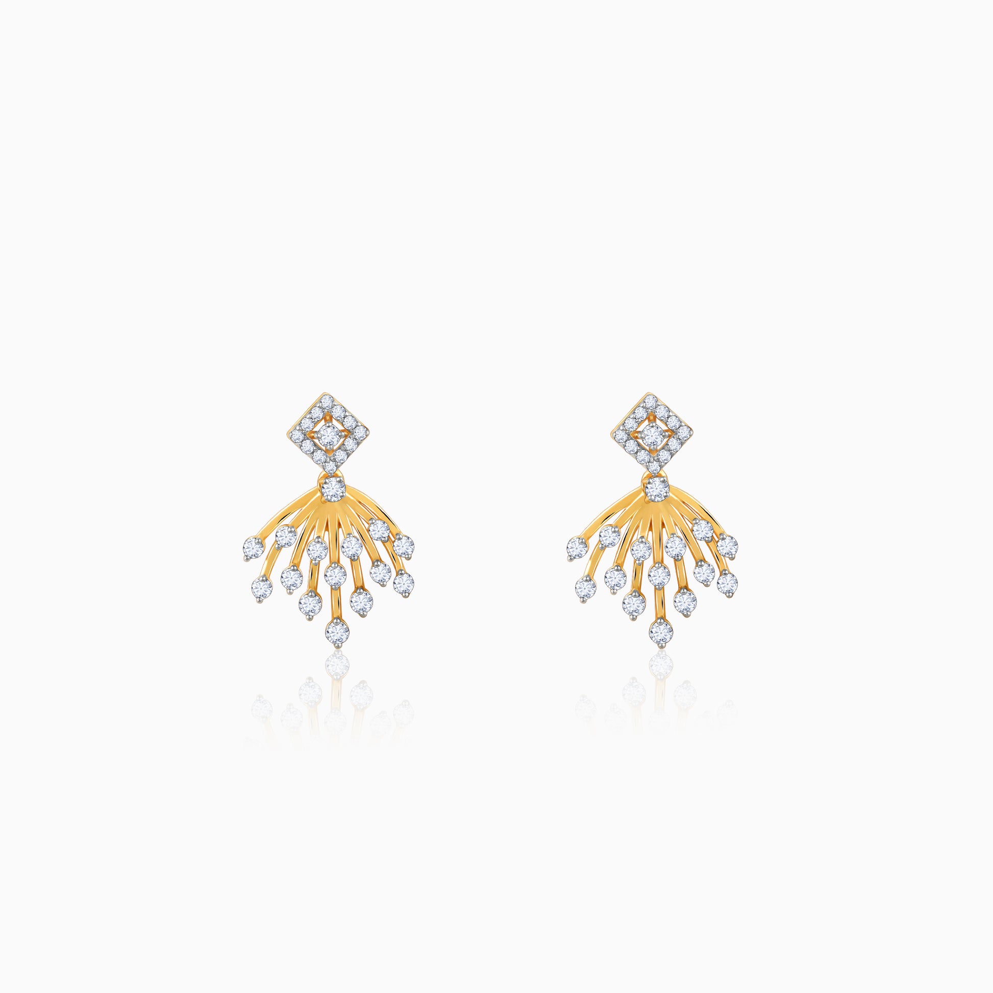 Gold double-drop earrings with sparkling stones.