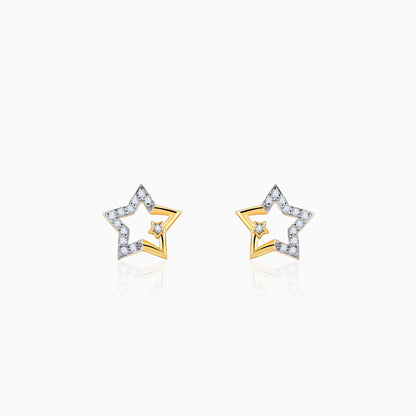 Pure gold star-shaped earrings with lab-grown diamonds.