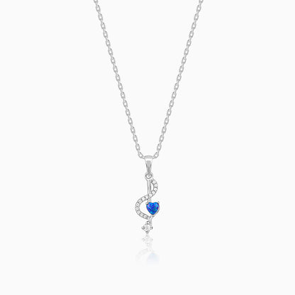 Silver music note pendant with blue opal and zircon accents