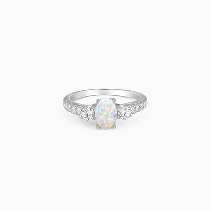 Silver ring with oval opal stone and zircons for women from GIVA Sky High collection.

