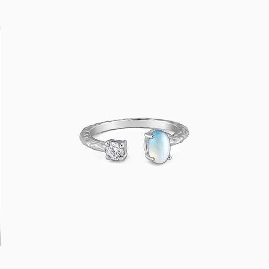 Silver open ring with moonstone and zircon accents






