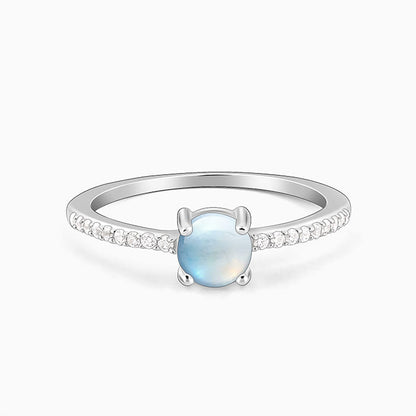 Silver ring with circular opal stone and zircon accents from GIVA Sky High collection.

