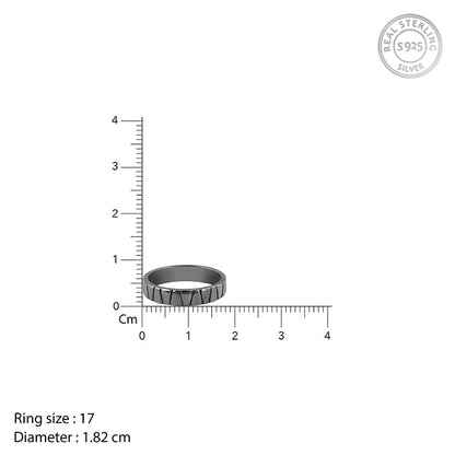 Black rhodium men's ring with tapered grooves across the band






