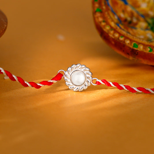 Silver Flower Pearl Rakhi