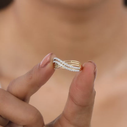 Pure gold ring with wave-like patterns and lab-grown diamonds.