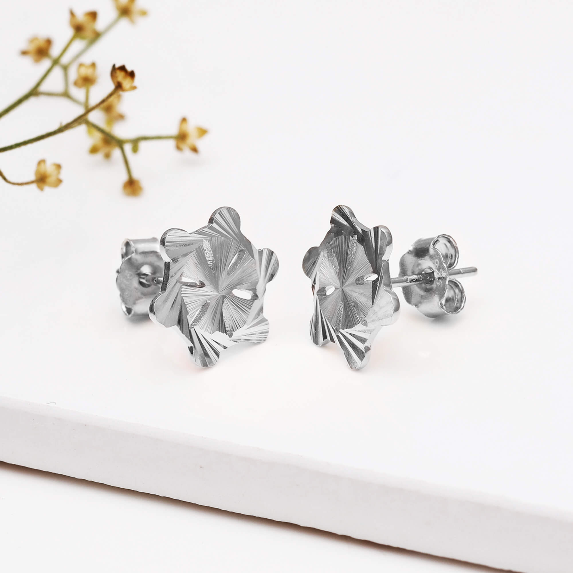 Buy Silver Plated Checker Floral Stone Embellished Ear Studs by Noor Online  at Aza Fashions.